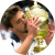 Former professional tennis player Goran Ivanisevic holding up the Wimbledon trophy